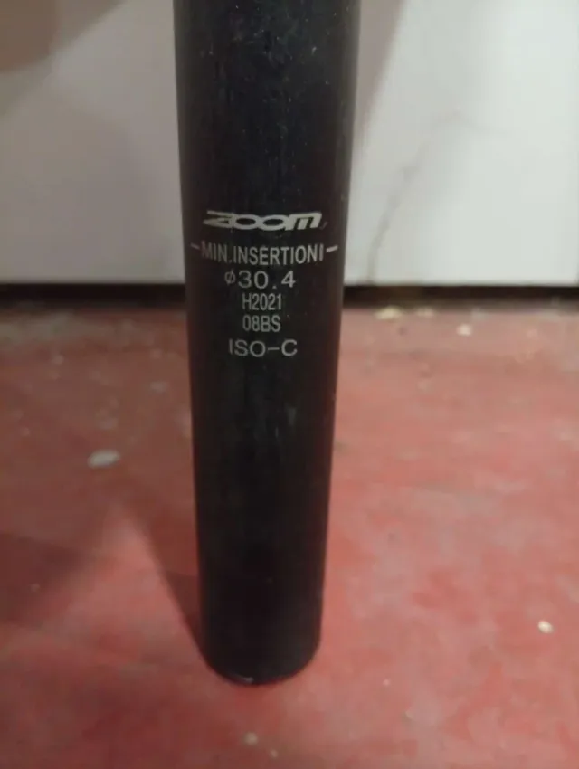 Tija con amortiguador para bicicleta