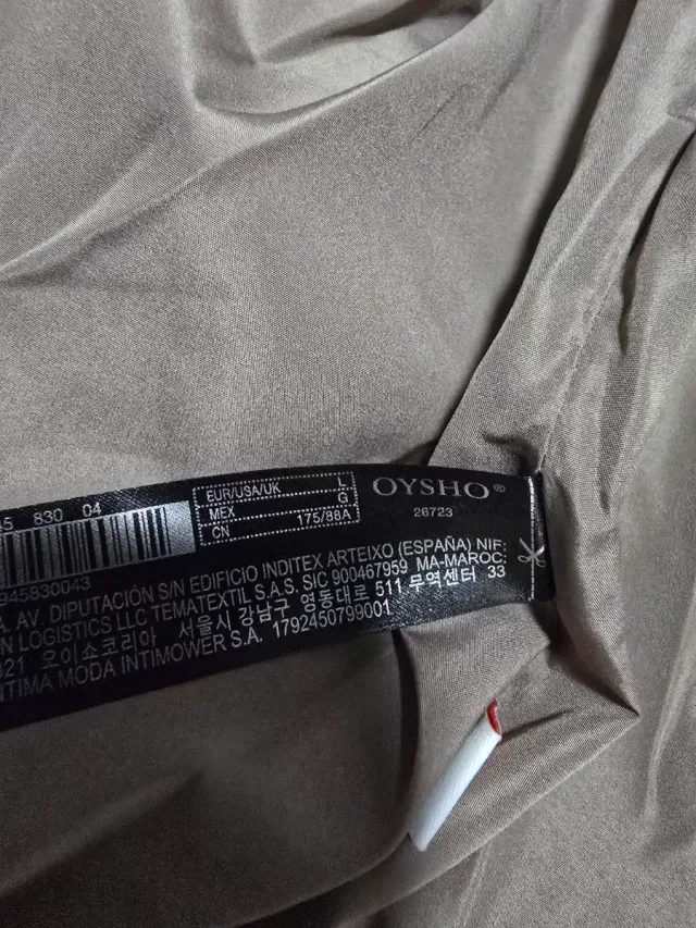Abrigo Oysho acolchado gris talla L