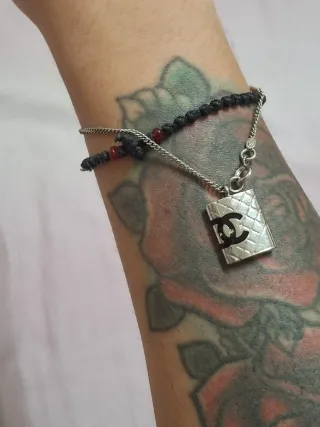 Bracciale Chanel autentico con ciondolo