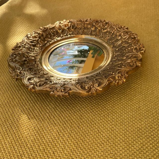 Specchio di bronzo occhio di bue