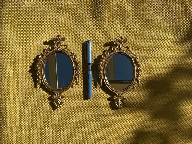 Specchio decorativo dorato vintage