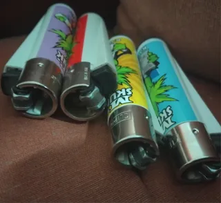 4 Accendini Clipper Karikato Mr. Skunk