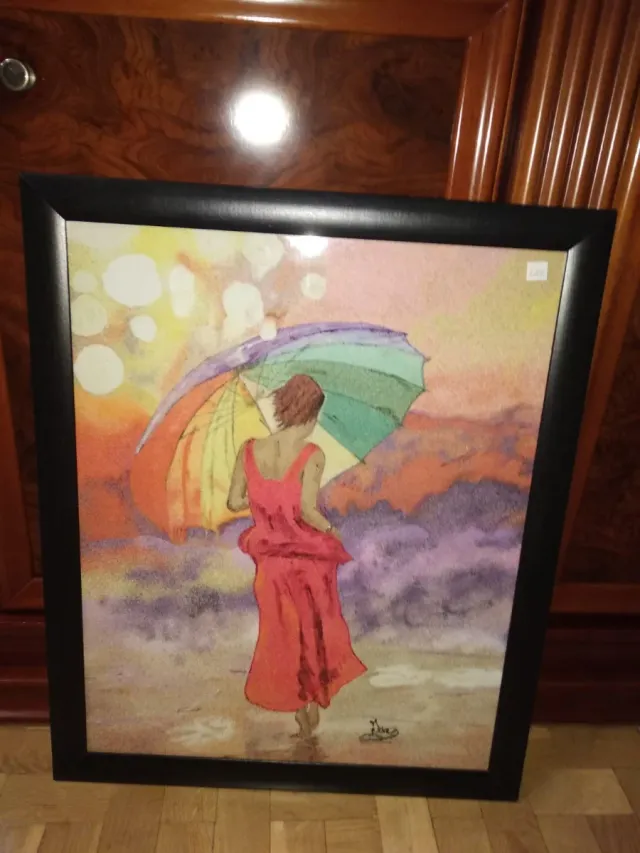 Cuadro de arena de mujer paraguas de colores