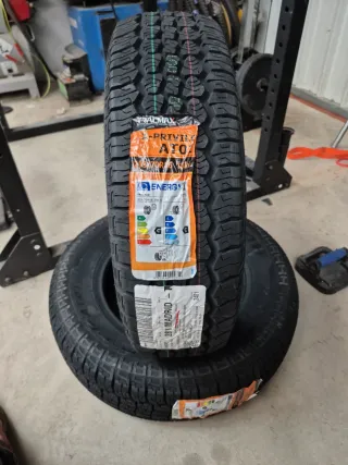 215/70R16 100H  TRACMAX  AT01 50%50