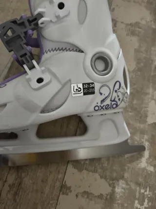 Patines de hielo Oxelo blancos y morados