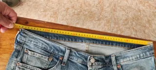 Pantalones Levis y lacoste Talla48 y44.