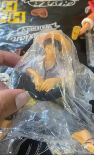 Lote One Piece:Figura y reloj de bolsillo de metal