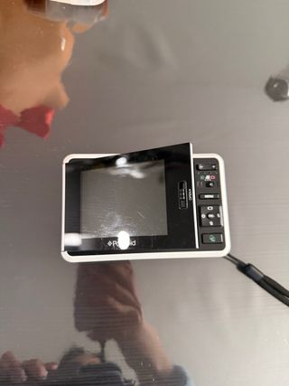 Cámara Polaroid Blanca con Rayas Arcoíris