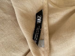 Vestido beige con tirantes y abalorios