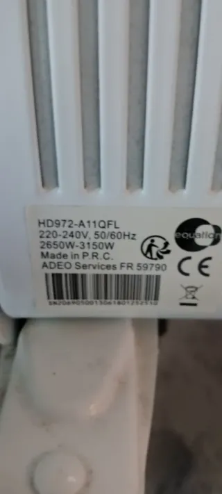 Radiador de aceite blanco y gris