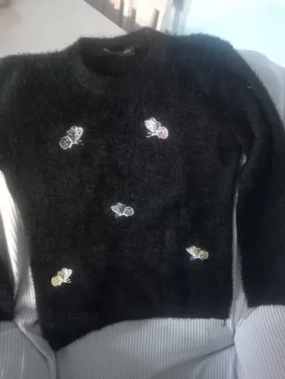 Jersey negro con mariposas