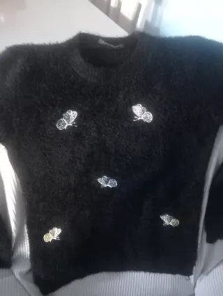 Jersey negro con mariposas