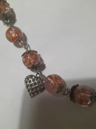 Bracciale con perle rosa e ciondolo cuore