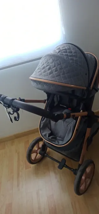 Carrito bebé 3 en 1 gris y cobre