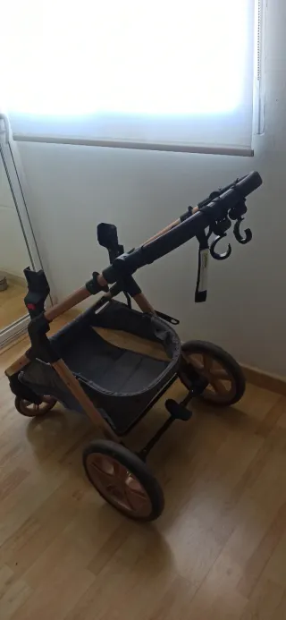 Carrito bebé 3 en 1 gris y cobre