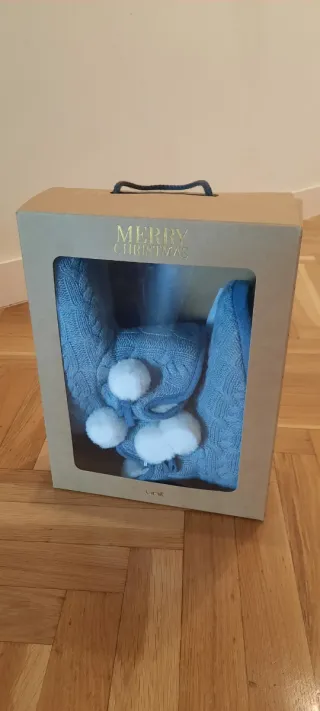 Botines azules de casa con pompones