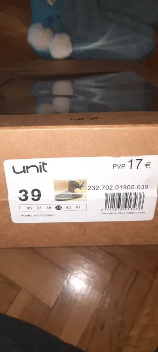 Botines azules de casa con pompones