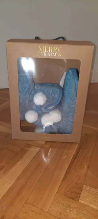 Botines azules de casa con pompones