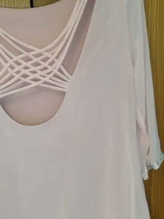 Blusa rosa con tiras cruzadas