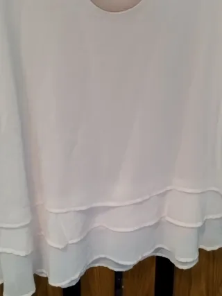 Blusa rosa con tiras cruzadas