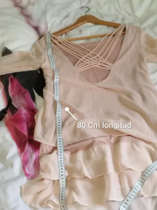 Blusa rosa con tiras cruzadas