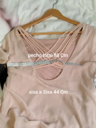 Blusa rosa con tiras cruzadas