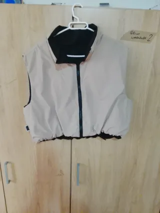 Chaleco reversible mujer beige y negro