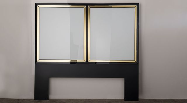 Cabecero de espejo negro y dorado