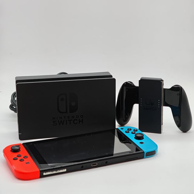CONSOLA SWITCH STANDARD + CARICABATTERIA + ACCESSORIO