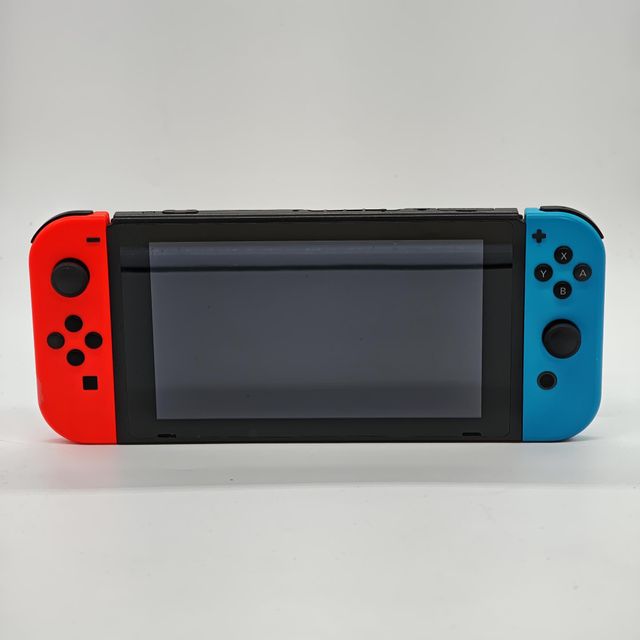 CONSOLA SWITCH STANDARD + CARICABATTERIA + ACCESSORIO
