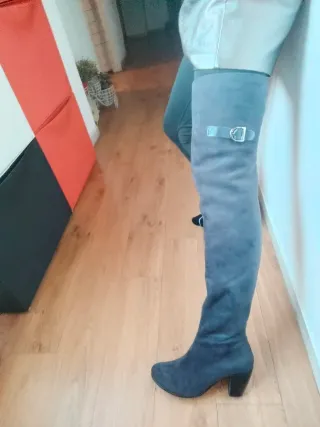 Botas altas negras con hebilla