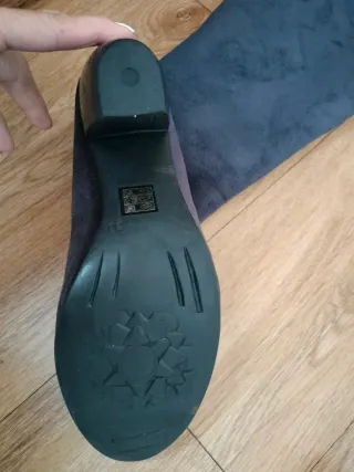 Botas altas negras con hebilla