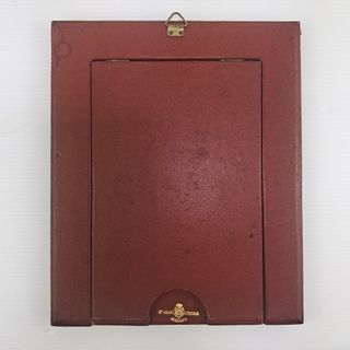 Vecchia cornice portafoto con foto antica