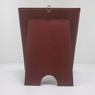 Vecchia cornice portafoto con foto antica