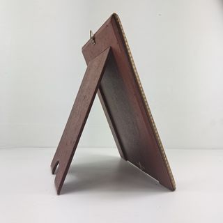 Vecchia cornice portafoto con foto antica