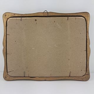 Vecchia cornice con foto antica donna