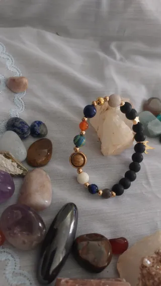 Pulsera Signo Aries Piedra Negra y Dorada