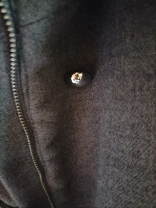 Trenca de paño Zara con capucha.