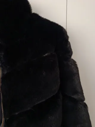 Chaquetón pelitos negro talla L.