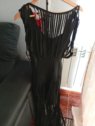 Vestido negro con flecos y chaqueta