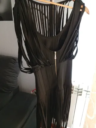 Vestido negro con flecos y chaqueta
