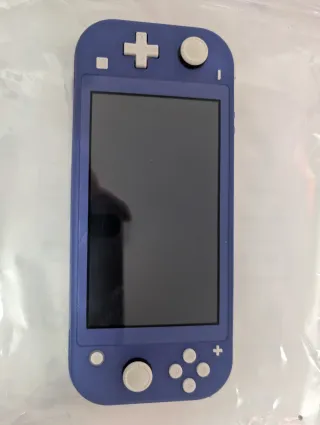Nintendo Switch Lite + Scheda SD + Gioco