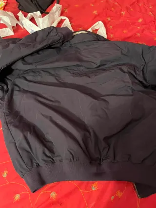 Chaqueta Slam Negra y Azul marino no ago envíos