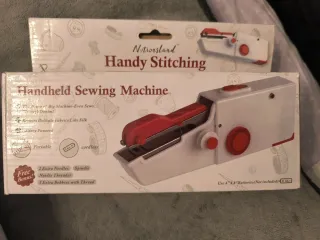 Máquina de coser manual portátil