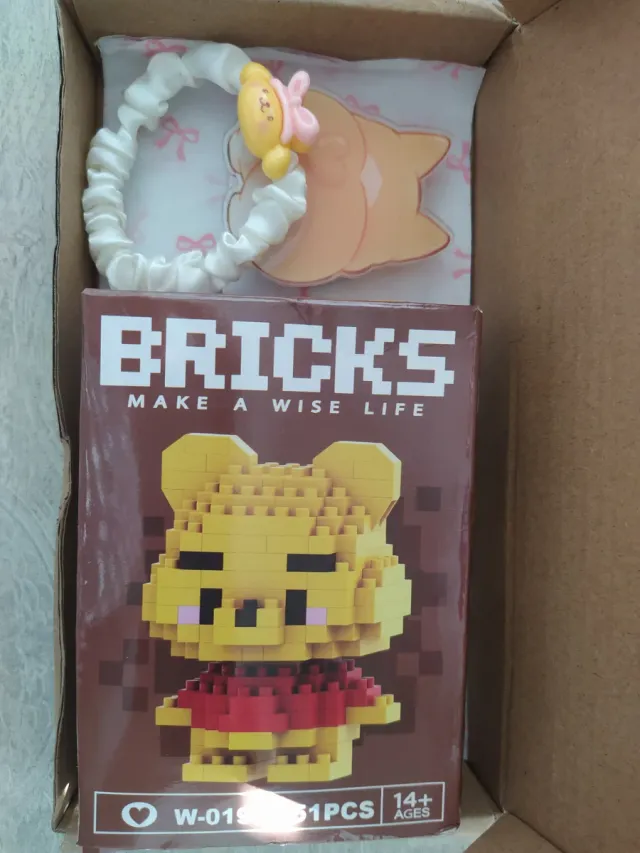 Pack Winnie the Pooh: Soporte móvil y coleteros.