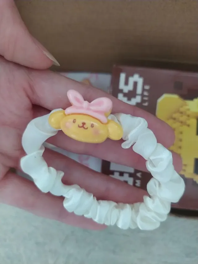 Pack Winnie the Pooh: Soporte móvil y coleteros.