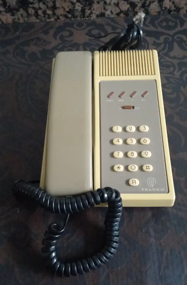 Teléfono Telyco beige y gris