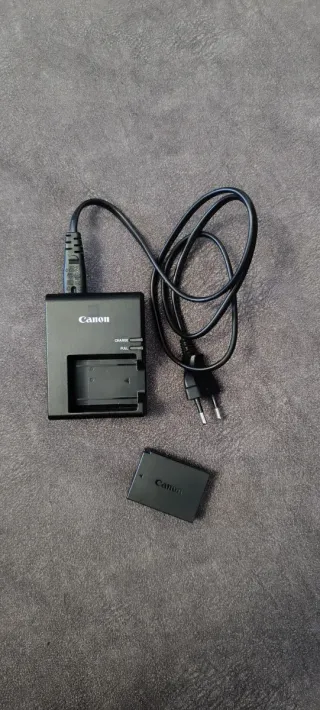 Caricabatterie e batteria originali Canon 1100
