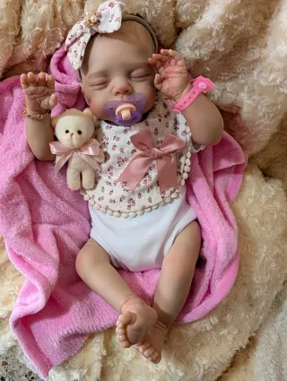 Reborn puedes venir a verla y tambien envío