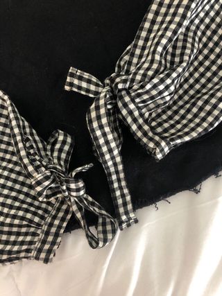 Camisa negra con mangas de cuadros(solo recoger)